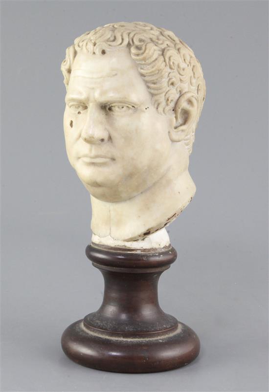 A marble portrait head of a man, possibly Emperor Vitellius, Roman Imperial or later total height 11.5in.